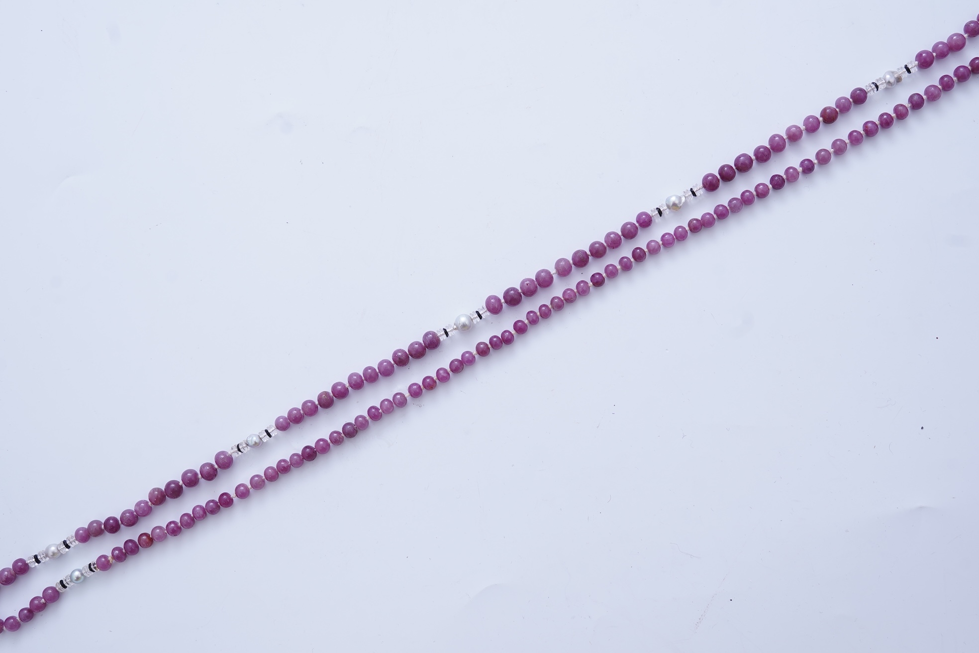 A ruby bead, onyx, rock crystal and pearl necklace